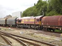 DBS 66129 performing a push-pull operation alongside Swindon platform 1 on 29 August in order to extract empty steel wagons from the nearby Hawksworth steel terminal, seen in the distance, for transfer to the yard beyond the east end of the station. <br><br>[David Pesterfield 29/08/2014]