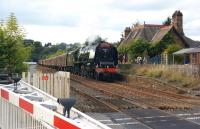Stanier pacific no. 46233 <I>Duchess of Sutherland</I> with the southbound <I>Cumbrian Mountain Express</I> on 6 September 2014 passing Culgaith, with the residents of the former station enjoying the spectacle from the adjacent fence.<br><br>[John McIntyre 06/09/2014]