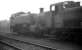 A pair of locally based 0-6-0 pannier tanks standing in a misty shed yard at Southall in August 1961. Nearest the camera is Collett 9791, with Hawksworth 1501 beyond.<br><br>[K A Gray 20/08/1961]
