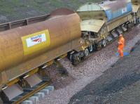 Ballast dropping on the Borders Railway at Newtongrange on 22 October 2014.<br><br>[Bill Roberton 22/10/2014]