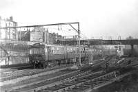 A North Clyde electric multiple unit passing Bellgrove Junction westbound on 15 November 1960 with an Airdrie to Dalmuir Park service.  <br><br>[G H Robin collection by courtesy of the Mitchell Library, Glasgow 15/11/1960]