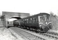 An empty DMU set leaves Uplawmoor station to run to Lugton where it will reverse. The photograph was taken on 30 March 1962, the penultimate day of passenger services to Uplawmoor.  <br><br>[G H Robin collection by courtesy of the Mitchell Library, Glasgow 30/03/1962]