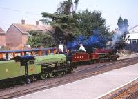 Scene at New Romney on the Romney, Hythe and Dymchurch Railway on 4 August 1990 with No 1 <I>Green Goddess</I> and No 5 <I>Hercules</I> in the station. <br><br>[Peter Todd 04/08/1990]