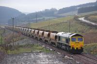 A ballast train just south of Heriot on 25 November. Freightliner locomotives 66605 (nearest) and 66610 in charge.<br><br>[Bill Roberton 25/11/2014]