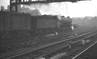 A freight passing to the south of Newcastle Central on the goods lines and heading for the King Edward Bridge on a grey day in 1961. Locomotive  is York B16 4-6-0 no 61444.<br><br>[K A Gray //1961]