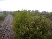 View south from Rotherham Masboro in October 2014, with the Midland Railway old main line to Chesterfield, bypassing Sheffield, on the left and the current main line to the right. Note the severe curve prior to the latter reaching the junction with the Holmes Chord line from Rotherham Central. [See image 49308 for the view north from the same bridge.] <br><br>[David Pesterfield 13/10/2014]
