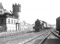 A Bridgeton - Clydebank train about to pass the <I>Yoker Castle</I> sewage facility on 4 September 1958 behind Parkhead V1 2-6-2T no 67616. <br><br>[G H Robin collection by courtesy of the Mitchell Library, Glasgow 04/09/1958]