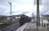 Black 5 44669 about to pass through Symington with a northbound freight in pouring rain on 30 July 1966, some 18 months after the station was closed to passengers.<br><br>[John Robin 30/07/1966]