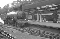 The east end of Newcastle Central, thought to have been photographed in 1961. The steam locomotive is  A2 Pacific no 60514 <I>Chamossaire</I>. Beyond  stands one of the South Tyneside electric units, displaying the legend <I>'South Shields - Stopping'</I>. The South Shields route was converted to DMU operation two years later and now forms part of the Tyne and Wear Metro.<br><br>[K A Gray //1961]