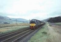 The up <I>Royal Scot</I> photographed shortly after passing Wandel Mill signal box just north of Abington on 26 September 1964 behind an EE Type 4 locomotive.  <br><br>[John Robin 26/09/1964]