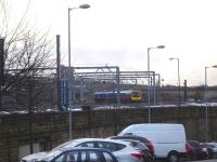TransPennine 185144 about to turn onto the King Edward Bridge on 13 January after leaving bay platform 9 at Newcastle Central as the 1206 service to Liverpool Lime Street via Manchester Victoria.<br><br>[David Pesterfield 13/01/2015]