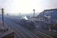 Perth based Black 5 no 45047 passing Stirling South signal box on a dull and misty February afternoon in 1965 with a train for Aberdeen. <br><br>[John Robin 07/02/1965]