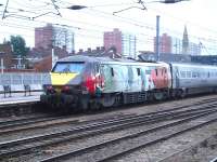East Coast 91111 <I>'For the Fallen'</I> propels the 05.48 ex Waverley to Kings Cross service out of Doncaster on 11 February 2015.<br><br>[David Pesterfield 11/02/2015]