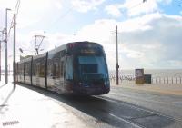 High tide at Blackpool as <I>Flexity</I> 003 leaves North Pier heading for Starr Gate. 21st February 2015 saw the highest astronomical tides for around nineteen years but fine weather meant Blackpool promenade was unaffected and tram services ran normally.<br><br>[Mark Bartlett 21/02/2015]