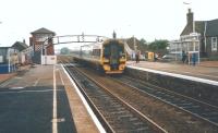 An Aberdeen-bound 158 arrives at Carnoustie in July 1998.<br>
<br><br>[David Panton 17/07/1998]