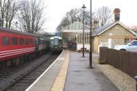 Scene at Stanhope station on 15 March 2015, with the Class 121 railcar preparing to depart for Wolsingham with the final round trip of the day. On the left the Mk 2 coaches which had previously been used for the <I>Polar Express</I>, wait for their transfer south (which took place on 20 March 2015).<br><br>[John McIntyre 15/03/2015]