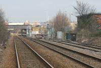Looking towards Wrexham General on 15 March from the level crossing at Croes Newydd just south of the station. The bridge parapet on the right marks the point where the short branch to Wrexham Central passes under the main line. <br><br>[Mark Bartlett 15/03/2015]