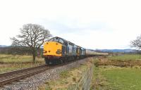 DRS 37607+37218 double heading the 1Z69 Pathfinder Tour to Kyle of Lochalsh north of Beauly on 4 April 2015.<br><br>[John Gray 04/04/2015]