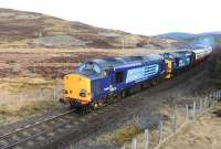 DRS 37607 and 37218 traveling fast on the approach to Tomatin on 6 April 2015 with the Pathfinder 1Z73 Inverness-Eastleigh railtour. <br><br>[John Gray 06/04/2015]