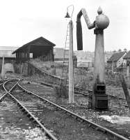 By the time of this photograph in September 1970, the coaling and watering facilities at Tweedmouth MPD had lain out of use for over four years, while the much longer disused roundhouse beyond had already been sold out of railway ownership to builders' merchants J. T. Dove.<br><br>[Bill Jamieson 19/09/1970]