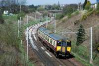 318262 coming round the reverse curves south of Carluke on the approach to Braidwood.<br><br>[Ewan Crawford 21/04/2015]
