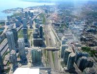 View westward from the CN Tower on 28 May 2015 showing GO Transit locohauled sets that park up all day in Toronto because of the large number of peak-only services using Union Station.<br><br>[John Yellowlees 28/05/2015]