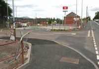 Vehicle entrance to Newtongrange station car park from the A7 on 16 July 2015, with some signage and partial landscaping now evident. Near the brow of the hill a pedestrian entrance is also nearing completion. [See image 51991]  <br><br>[John Furnevel 16/07/2015]