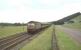 Brush Type 4 D1752 with a Perth to Euston train at speed south of Lamington in July 1965.<br><br>[John Robin 10/07/1965]