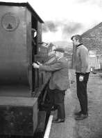 Ian N Fraser (who purchased 46464 and Morayshire for preservation) and Eric Cooper, photographed at Boat of Garten in 1973.  Eric, the last surviving founder member/director of the Strathspey Railway Company, sadly passed away on 27 July 2015, at the age of 87, following a long illness.<br><br>[Bill Roberton //1973]