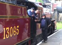 Conversation piece at Bury on 19 July 2015, prior to 13065 reversing out of the station [see image 52061].<br><br>[Ken Strachan 19/07/2015]