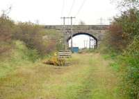 The viaduct carrying the L&A route from Kilbirnie Junction to Kilwinning East (closed 1953) over the closed GPK&A route from Dalry to Kilmarnock (closed 1973) just to the north east of Kilwinning. View south east in 1996. Redstone Siding was behind the camera.<br>
<br><br>[Ewan Crawford //1996]