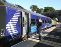 <I>'Hello there! It's good to be back!'</I> The first scheduled passenger train on the Borders Railway calls at Newtongrange on 6 September 2015 on its way from Tweedbank to Edinburgh.<br><br>[John Furnevel 06/09/2015]