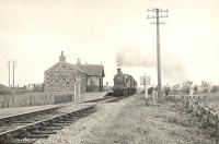 D1 4-4-0 62230 passing Philorth Halt on 12 July 1950 with a Fraserburgh - Aberdeen train.<br><br>[G H Robin collection by courtesy of the Mitchell Library, Glasgow 12/07/1950]