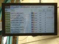 There is a very sparse timetable for services to Portbou from the south for an early August, for period from Friday early evening through to mid morning Saturday, as indicated on the arrivals display for that period. Of note is the fact that all signage at stations has English as one of the three languages, plus rather than RENFE the provider is shown as Adif - the Spanish version of Network Rail.<br><br>[David Pesterfield 07/08/2015]