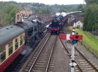 Steam services crossing at Bewdley on 26th August. The service on the left is for Bridgnorth, that on the right for Kidderminster. Despite taking a wrong turn, I had comfortably outpaced the latter in my car from Highley.<br><br>[Ken Strachan 26/08/2015]