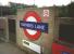 The classic LT roundel (or bullseye) seen here at Rayners Lane in July 1994. Not untypically for Metroland the station came first, in 1906, when Rayners Lane was just that - a lane. It suddenly became a suburb between the wars and mushroomed.<br>
<br><br>[David Panton 14/07/1994]