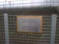 This plaque, recently affixed to the platform fencing at Shawfair, commemorates the life of local railway historian and author, Jeff Hurst.<br><br>[John Yellowlees 14/11/2015]