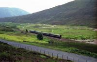 A pair of Class 158s head north near Dalnaspidal in 1994<br><br>[John McIntyre 12/08/1994]