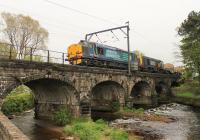 DRS 37606 and 20308, and three flask wagons, cross the River Wyre at Scorton heading for Sellafield on 22nd May 2015. The innocuous looking Wyre would later cause severe problems when it flooded and breached further down stream in December 2015.<br><br>[Mark Bartlett 22/05/2015]