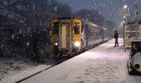 156513 works the 1A17 Kilmarnock to Glasgow Central service in very wintry conditions through Kilmaurs on 8 January 2016. This service has since been temporarily suspended and replaced by Virgin Voyagers until the bridge over the Clyde at Lamington is reopened in February.<br><br>[Ken Browne 08/01/2016]