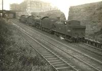 A locomotive quartet on its way from Eastfield shed to Queen Street station descending Cowlairs Incline on 6 September 1955. Leading is N15 69179, followed by B1s 61396 and 61134. Bringing up the rear is D49 62716 <I>Kincardineshire</I>. The first three are residents of 65A, while the D49 is a visitor from Thornton Junction.<br><br>[G H Robin collection by courtesy of the Mitchell Library, Glasgow 06/09/1955]