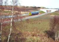 The 1128 ex-Tweedbank, formed by ScotRail unit 158728, photographed on 15 February 2016. The train is heading north along the new route opened in 2015 between Shawfair and Newcraighall.<br><br>[John Furnevel 15/02/2016]