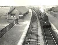 BR Standard class 4 2-6-4T 80113 reaches the end of its journey as it runs into Uplawmoor station on 11 July 1956 with the 5.42pm train from Glasgow Central. <br><br>[G H Robin collection by courtesy of the Mitchell Library, Glasgow 11/07/1956]