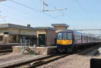 Northern Electric 319377 departs from the restored Platform 3 at Huyton on 14th March 2016 with a stopping service from Lime Street to Wigan.  In the foreground the line through Platform 4 comes to an abrupt halt but will eventually be connected. <br><br>[Mark Bartlett 14/03/2016]