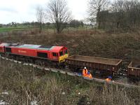 DBS 66114 patiently awaits loading with spoil from trackside drainage excavations.<br><br>[Martin MacGuire 02/04/2016]