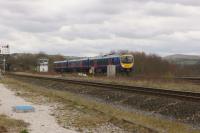 A TransPennine Express service from Cleethorpes to Manchester Airport passes New Mills South Jct in the early afternoon of 09 April 2016. The track in the foreground is from New Mills Central while the Class 185 is on the line that leads to Hazel Grove and Stockport.<br><br>[John McIntyre 09/04/2016]