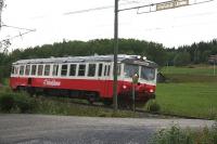 This Fiat-built Y1 diesel railcar is normally only seen on the Inlandsbanan i.e. the non-electrifed North-South route between Mora and Gällivare. That route shares a short section with Mittbanan east of Östersund. These units have also been seen west of Östersund as here at Svensta Level Crossing west of Järpen. The crossing is open. It has an overhead height limit indicator on wooden poles and a mirror for visual confirmation that the track is clear seen here obscuring part of the railbus front window. A light is provided to warn for the approach of oncoming trains [see image 57536] and [see image 57524].<br><br>[Charlie Niven 31/07/2014]