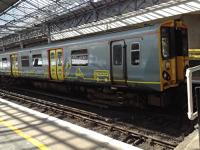 Gray Merseyrail liveried train at Southport.<br><br>[Veronica Clibbery /04/2016]