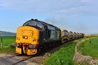 37688 <i>Kingmoor TMD</i> and 37607 are running late as they approach the site of the closed station at Clunes with five autoballasters for Fodderty.<br><br>[John Gray 06/06/2016]