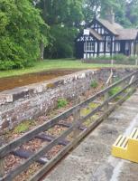 Track has been re-laid in the dock platform at Dunrobin Castle. Fencing makes this a difficult shot from the train.<br><br>[John Yellowlees 03/07/2016]